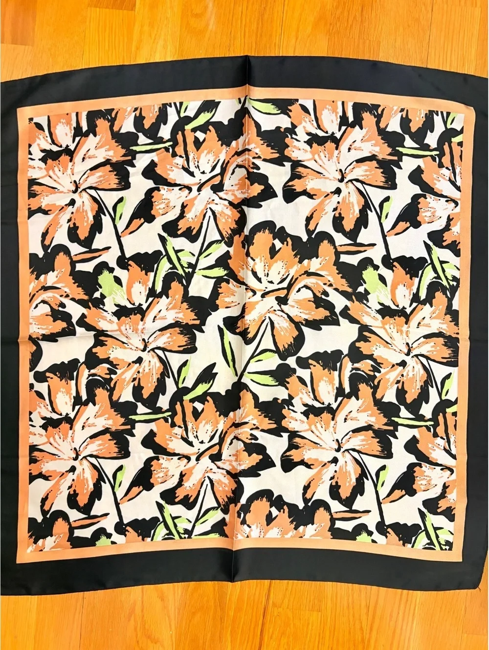 Elegant Floral Patterned Scarf with Black and Orange Border